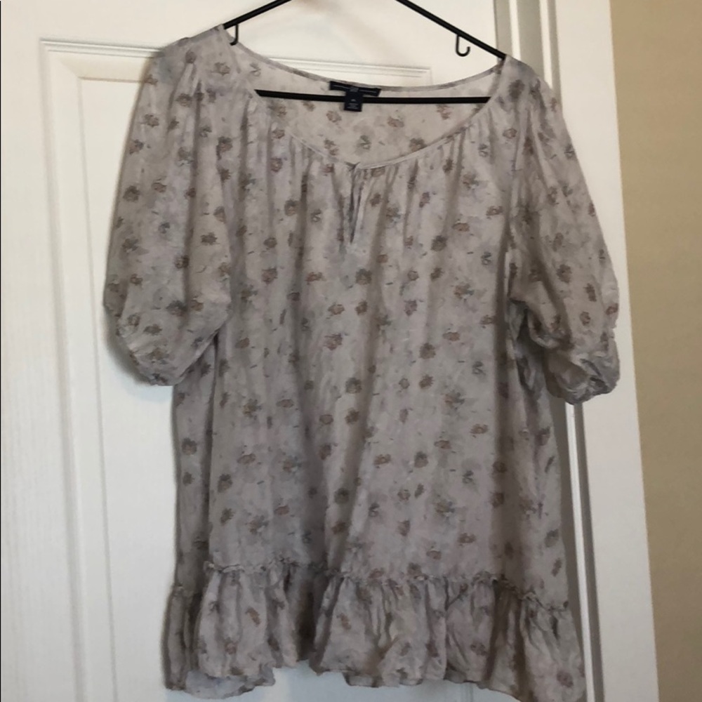 Dark gray floral blouse.